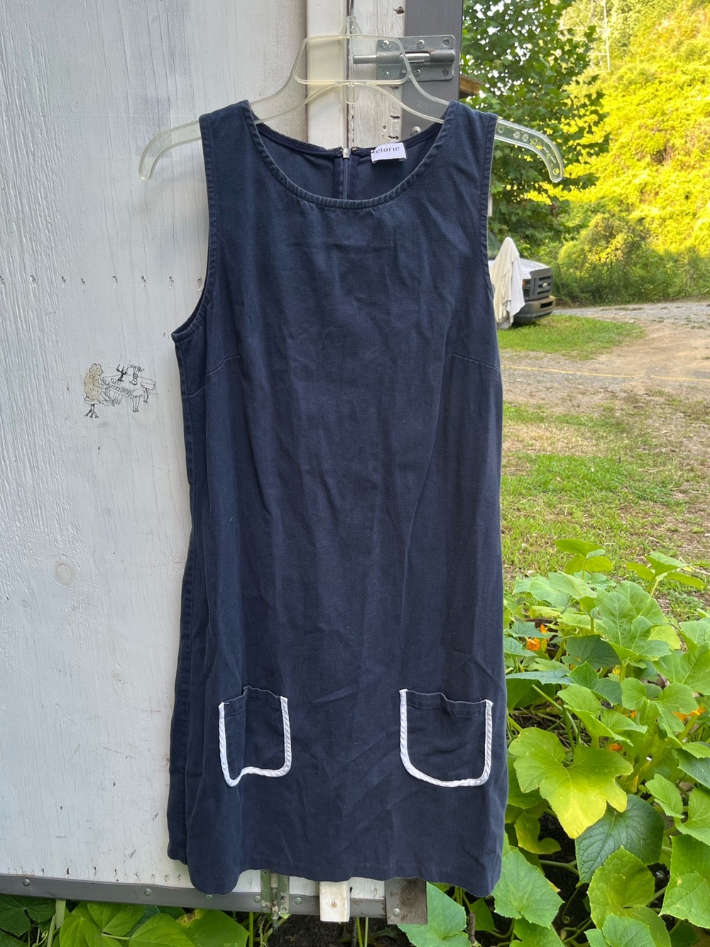 Sleeveless Navy Shift Dress with White-Trim Pockets